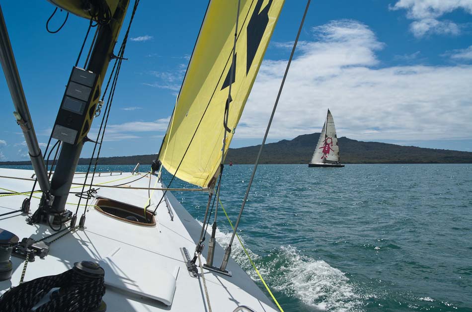 America's Cup yacht, view of Rangitoto Island, Auckland
