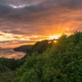 Výchos slunce nad Halfmoon Bay, Stewart Island, Nový Zéland | fotografie